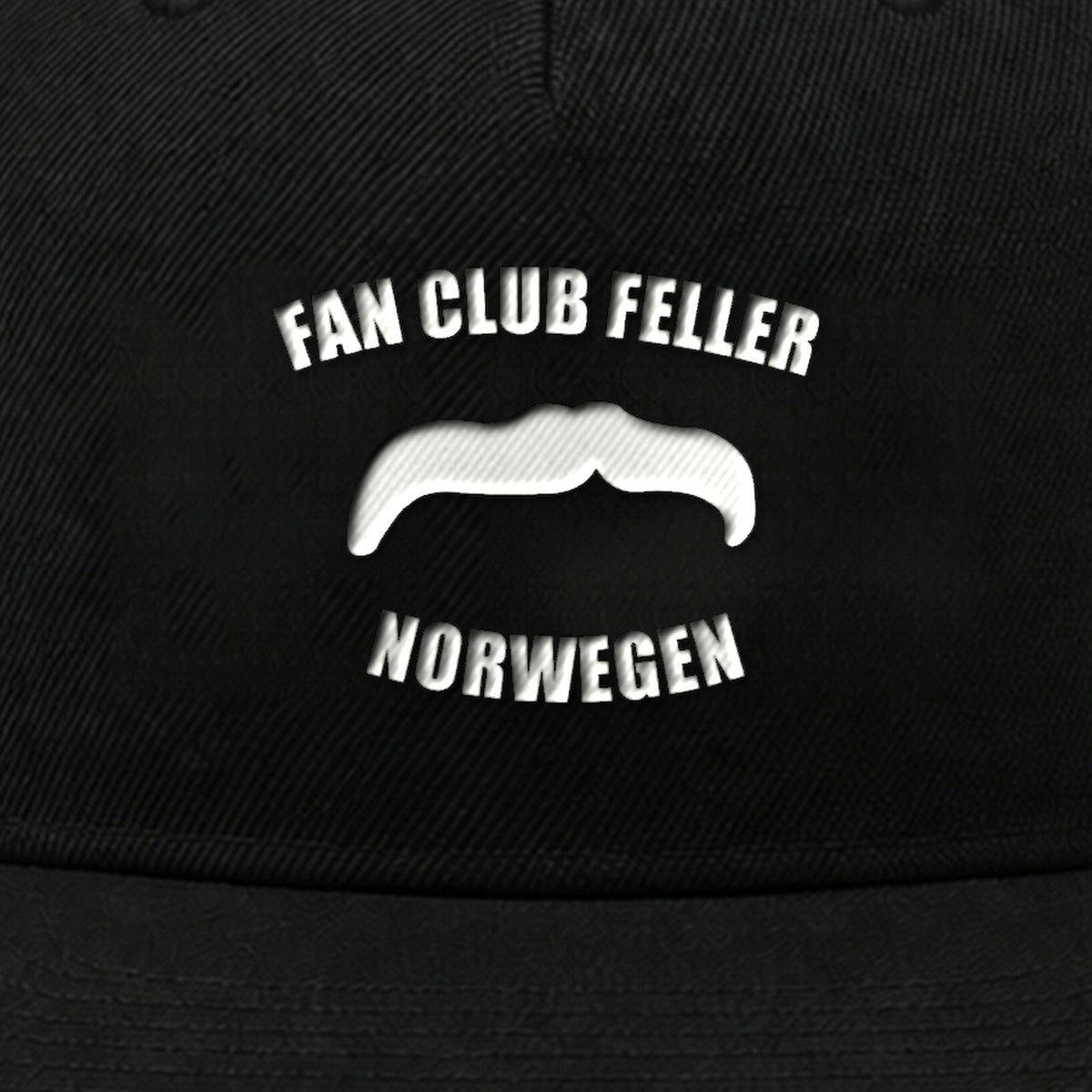 Manuel Feller Fan Club Norway Cap in black with white Fan Club Feller Norwegen moustache logo – close-up of the embroidery