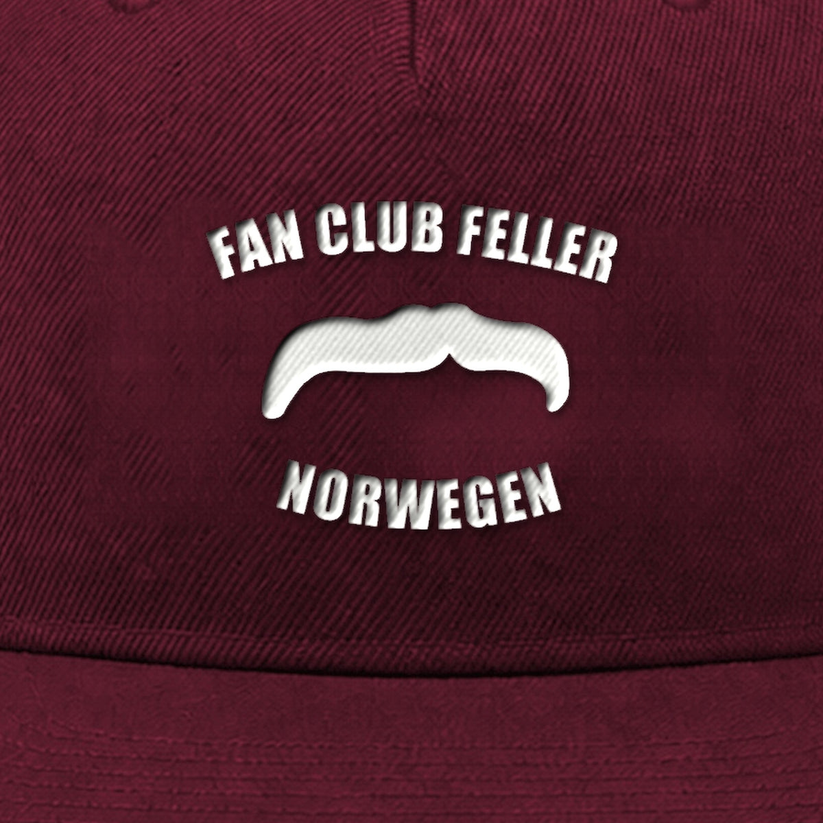 Manuel Feller Fan Club Norway Cap in burgundy with white Fan Club Feller Norwegen moustache logo – close-up of the embroidery