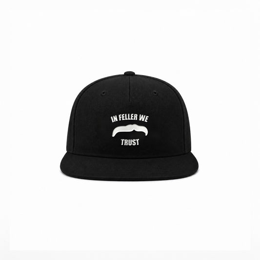 Manuel Feller In Feller We Trust Cap in black with white "In Feller we trust" moustache motif – front view