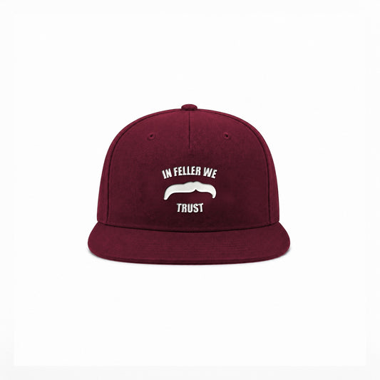 Manuel Feller In Feller We Trust Cap in burgundy with white "In Feller we trust" moustache motif – front view