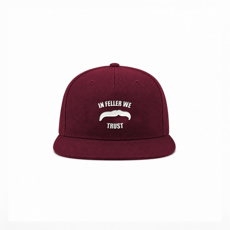 Manuel Feller In Feller We Trust Cap in burgundy with white "In Feller we trust" moustache motif – front view