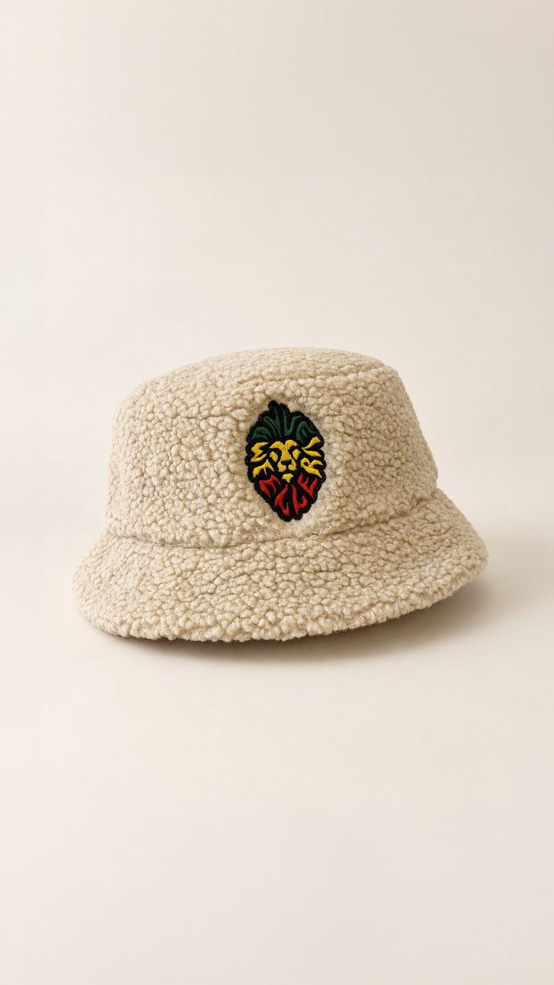 Manuel Feller Limited Bucket Hat Rasta Lion Sherpa Beige